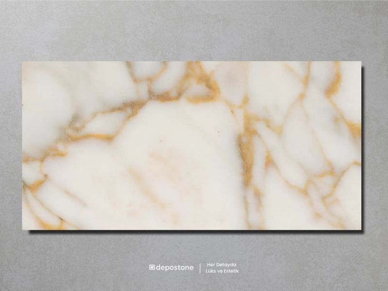 Afyon Gold marble tile with honey tones and golden veining.