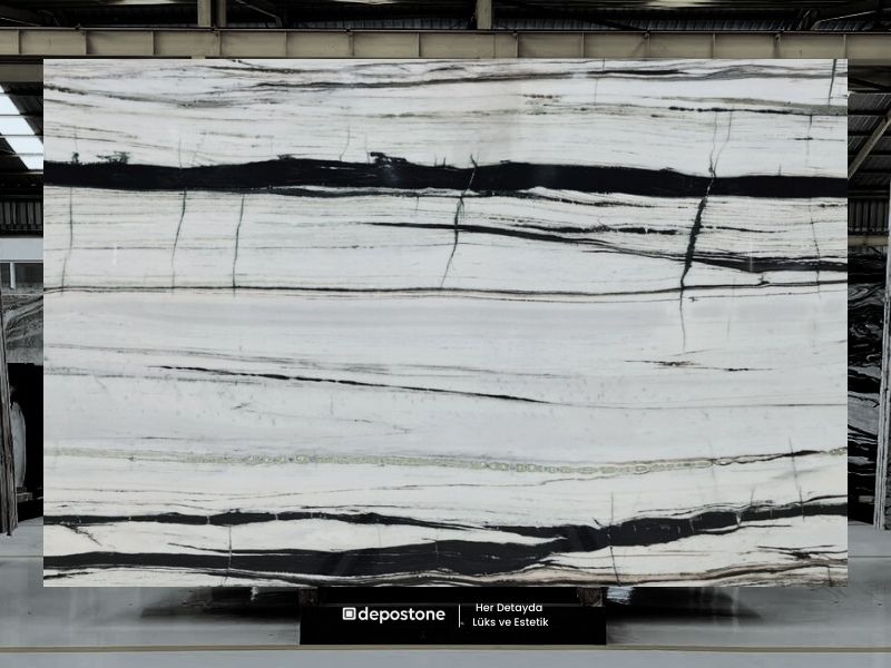 Panda White: Remarkable polished bookmatched marble slab with dramatic black and white veining.