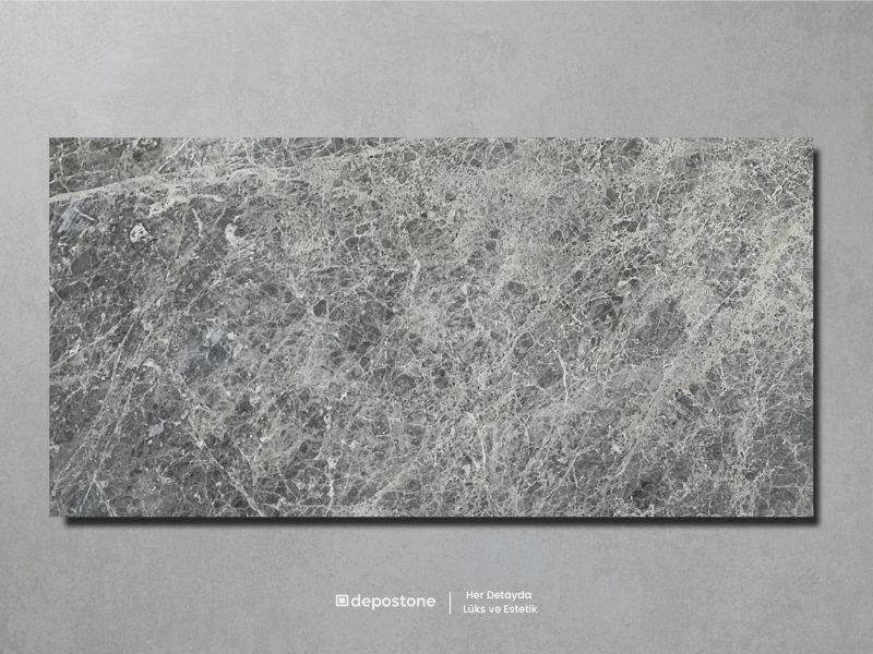 Ritali Grey Marble honed tile featuring distinctive spider-textured veining on a smoky grey background.