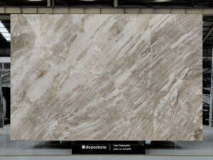 Premium Coffee Latte Marble slab with rich cream tones and bold diagonal veining by Depostone